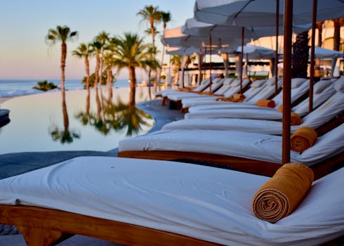 Luxury Hotels With Infinity Pools Overlooking White Sand Shores