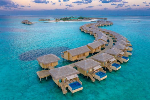 Maldives Sunset Overwater Villas Facing Endless Ocean Horizon